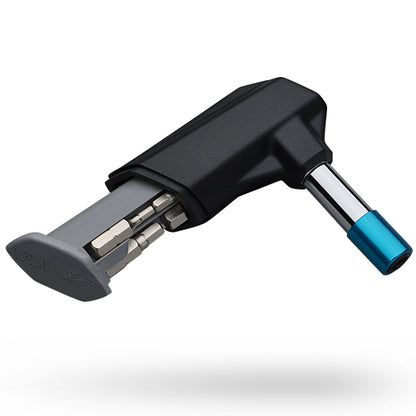 Studio side view of mini torque wrench with hidden wrench compartment pulled out of handle. 