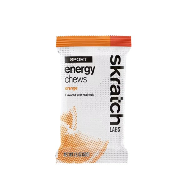 Skratch Labs Orange Sport Energy Chews package on a white background