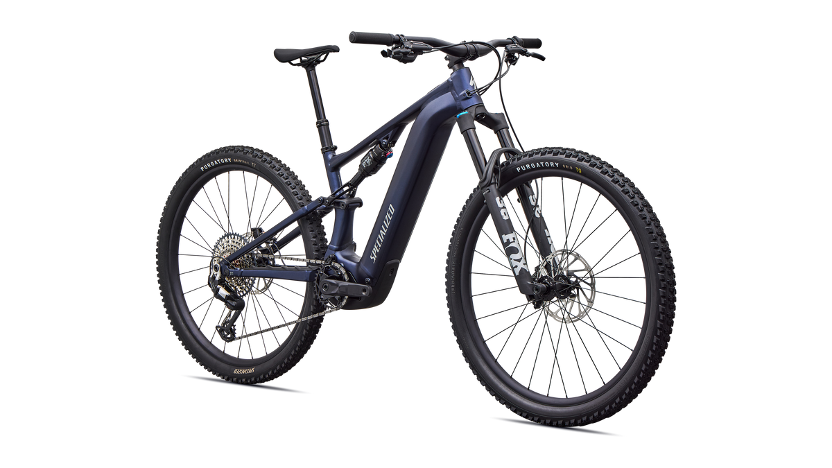 Angled view of blue Specialized Levo R Comp Alloy electric assist mountain bike on white background