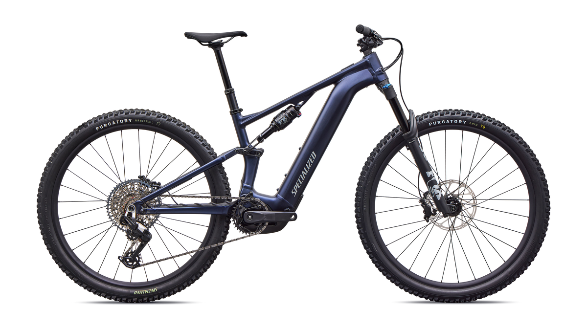Profile view of blue Specialized Levo R Comp Alloy electric assist mountain bike on a white background