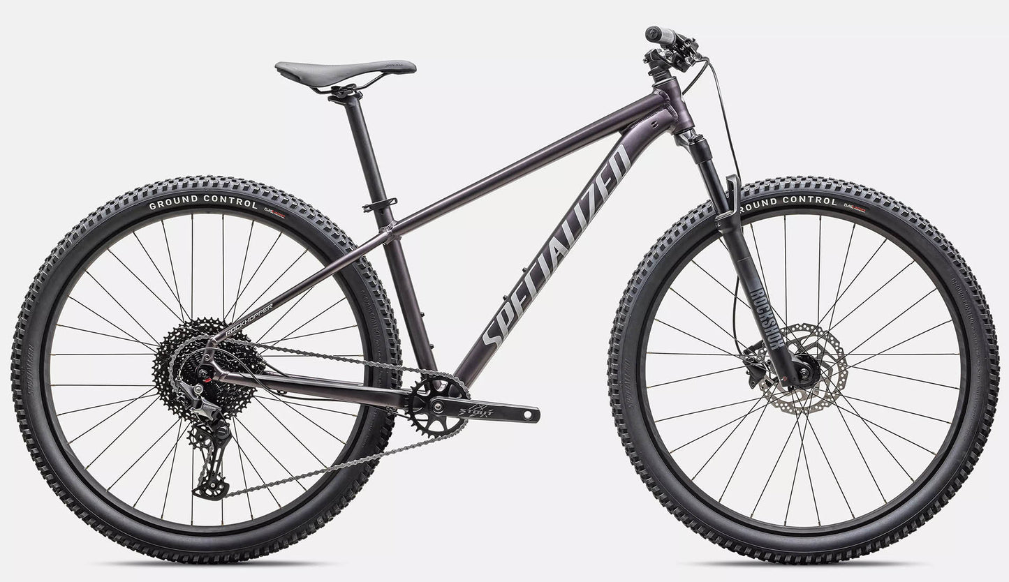 Side view of the Specialized Rockhopper Comp 29 Mountain Bike in Nebula Metallic / Dolomite Metallic, shown on a white background.