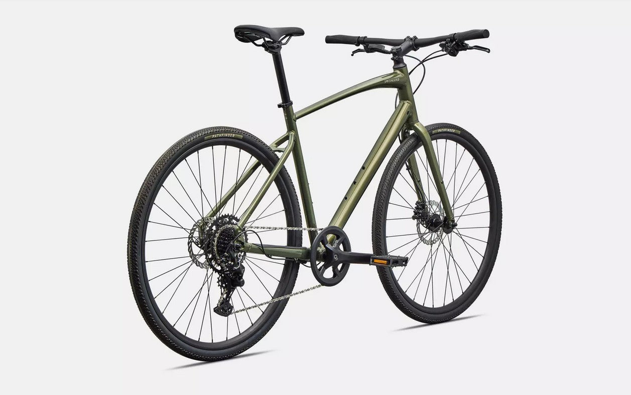 Back right profile view of an olive green Specialized Sirrus X bicycle with black components on a white background. 