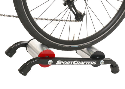 This is a side view of the SportCrafters Trike Trainer Overdrive, shown with a trike mounted, on a white background.
