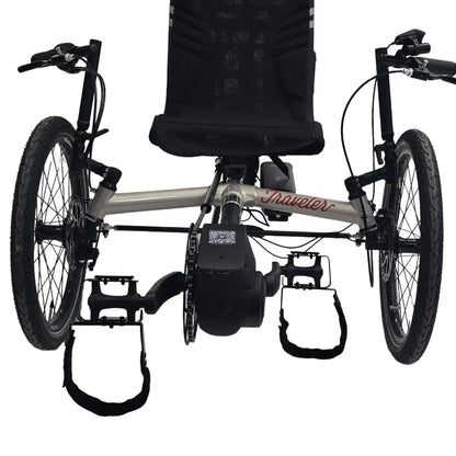 View of the TerraTrike Comfort Pedal Conversion Kit Pair mounted on a trike against a white background.
