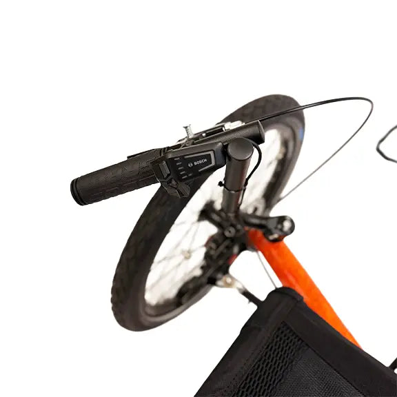 Closeup view of the Bosch controller on the TerraTrike Gran Tourismo e-Plus Flame On Recumbent Trike against a white background.