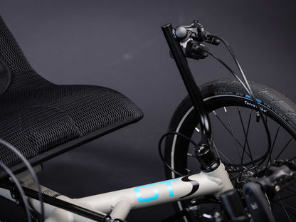 A closeup of the main frame and left handlebar of the TerraTrike GTS Recumbent Trike in Fog.