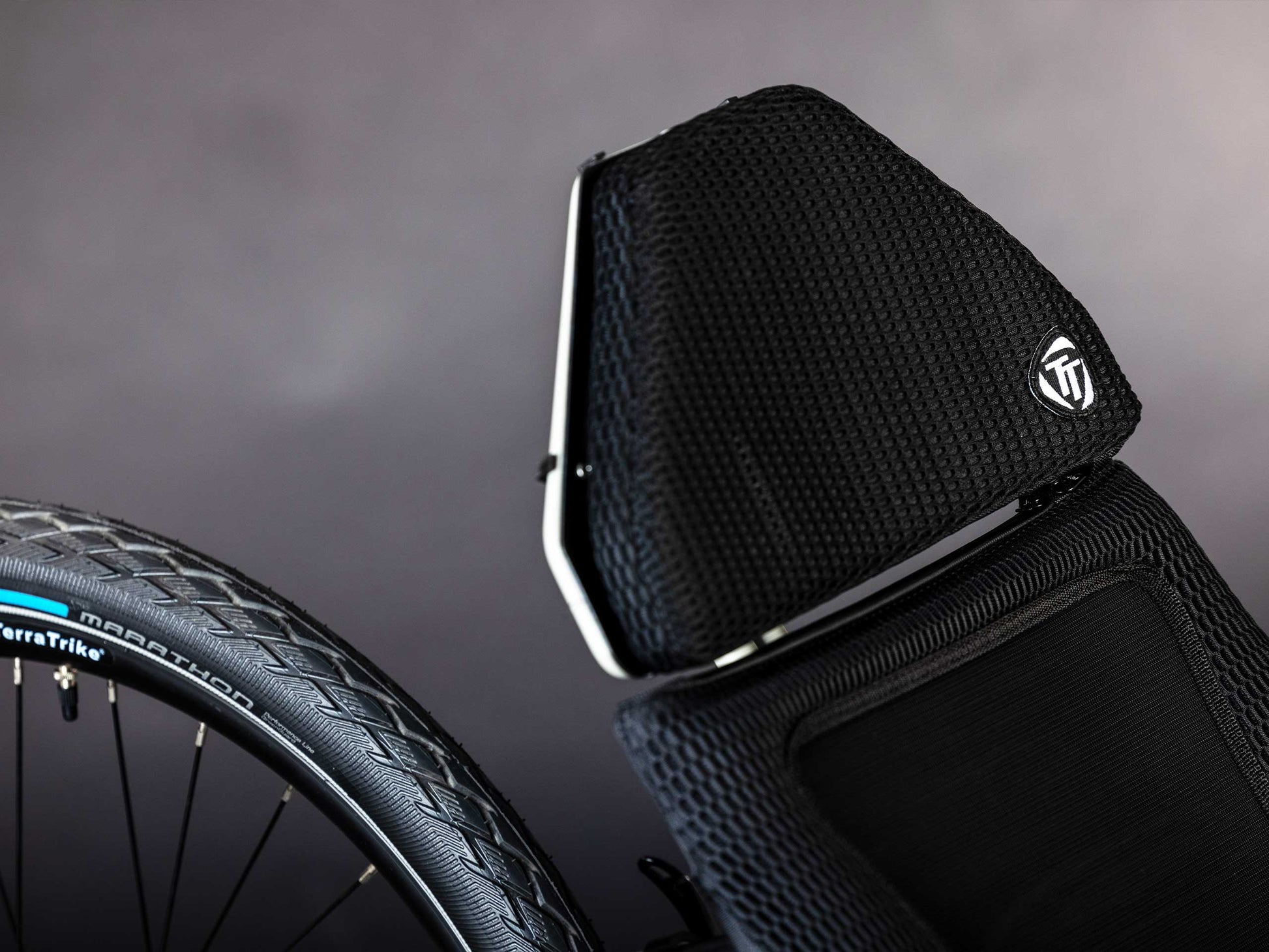 The front of the mesh seat of the TerraTrike GTS Recumbent Trike in Fog.