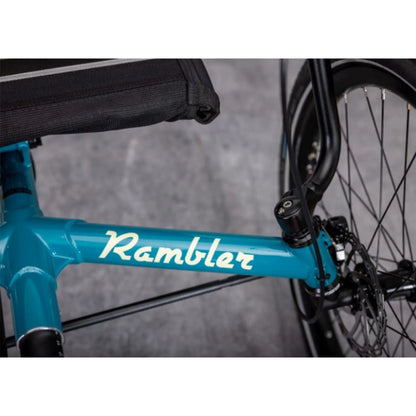 Close-up view of the front frame on the TerraTrike Rambler E-Plus Recumbent Trike in Gemstone against a grey background.