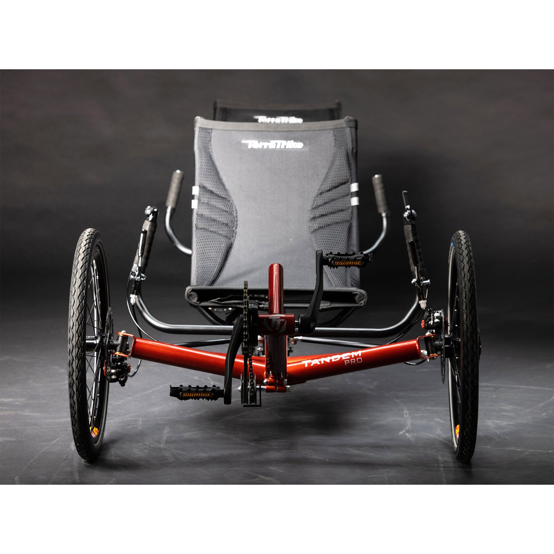 Front view of the TerraTrike Tandem Pro Sparkle Copper Recumbent Trike against a grey background.