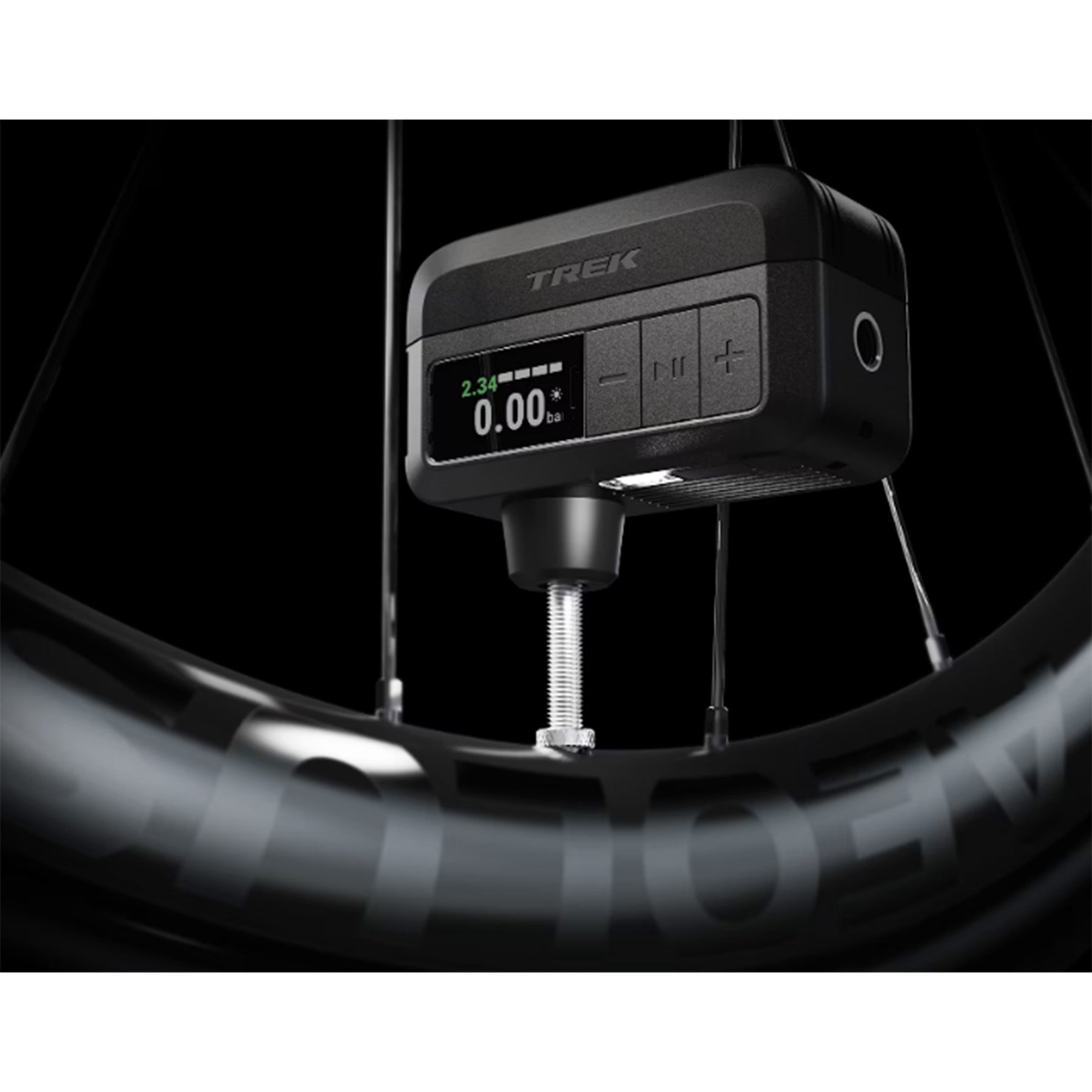 Trek Air Rush Pump attached to a presta valve stem on a wheel.