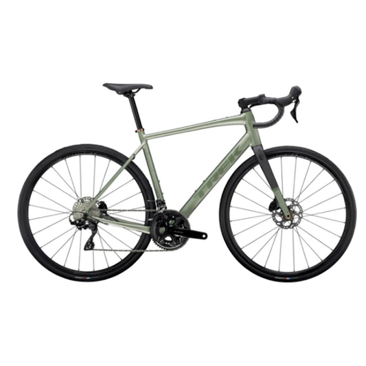 Side view of the Trek Domane AL 5 Road Bike in Lichen Green against a white background.