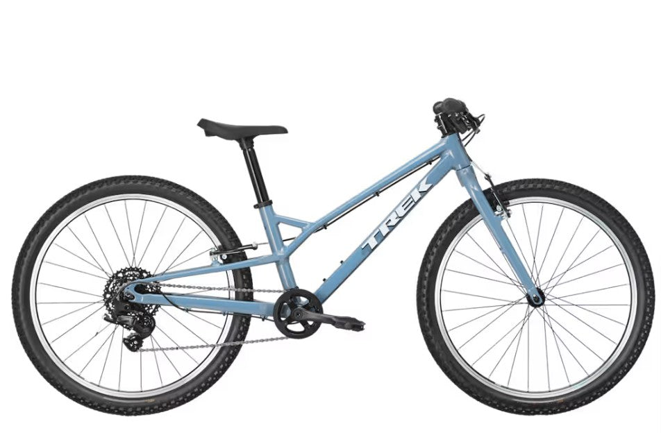 Profile view of blue Trek bicycle with white lettering and black components on a white background.