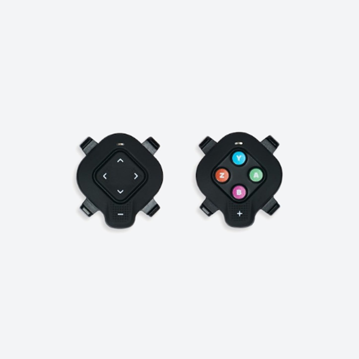 Closeup view of the Zwift Click module for a Wahoo indoor cycling trainer against a white background.