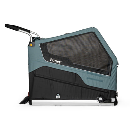 Side view of the Burley Bark Ranger XL Pet Trailer, shown with wheels removed, on a white background.
