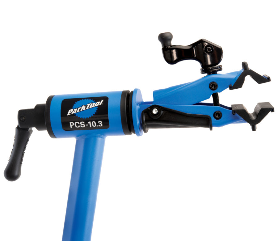 Studio image of profile view of the clamp and lever mechanisms. 