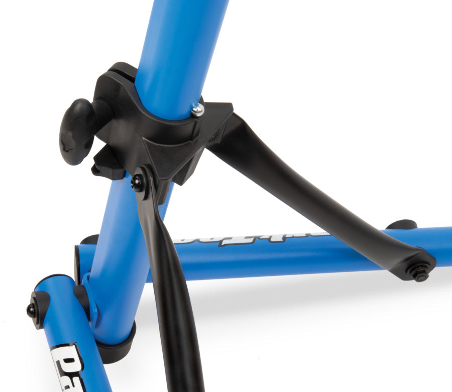 Close up studio image of the folding hinge for the collapsible legs.