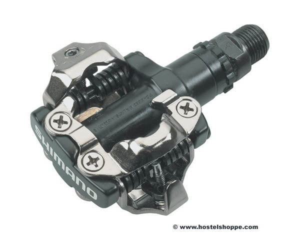 Shimano M520 SPD Pedals on a white background, showing the top of the pedal as well as the spindle 