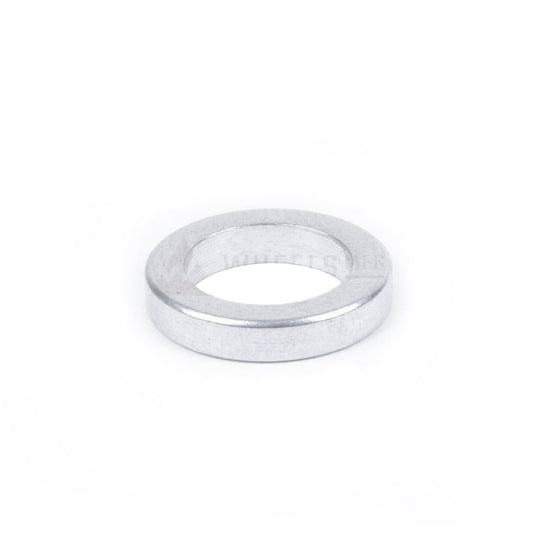 View of a single silver 2mm Wheels Manufacturing Chainring spacer