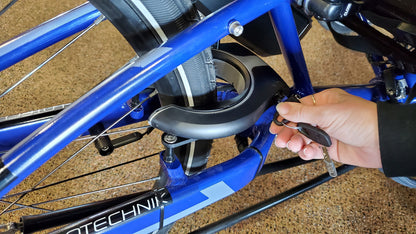 HP Velotechnik Retrofit AXA Frame Lock for Gekkos being used to lock an HP velotechnik gekko's rear wheel in place